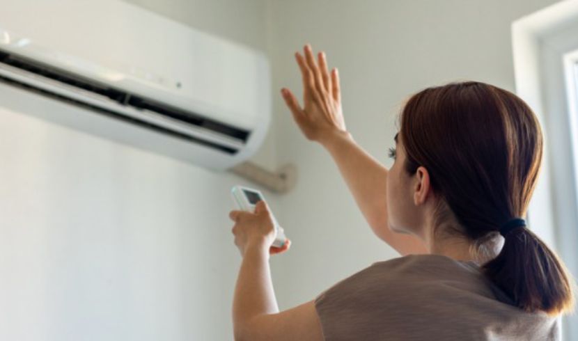 why is air conditioner blowing warm air